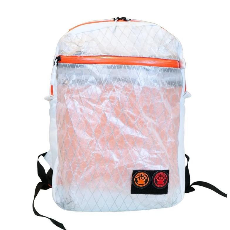 Scrambler 17L in white hemp X-Pac with orange zippers