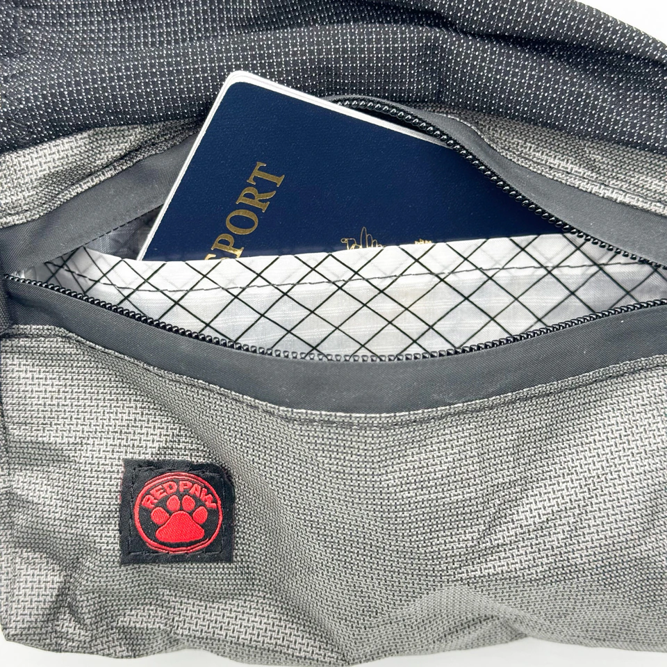 Inside the Flex Fanny Pack showing the interior pocket holding a passport